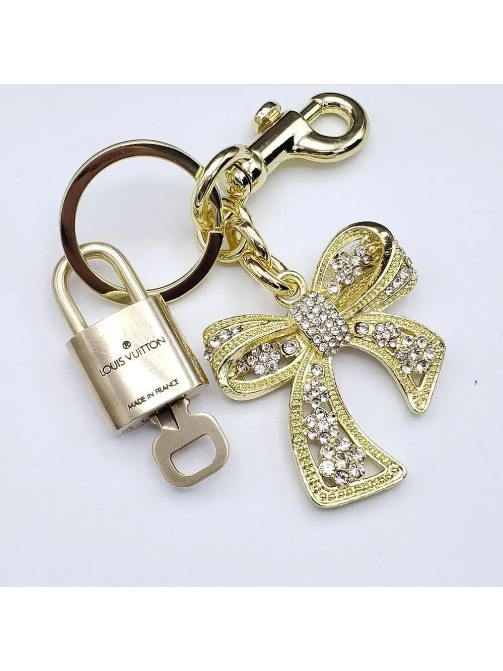 Authentic Louis Vuitton Lock & Key with Unbranded Ribbon Charm, Keychain